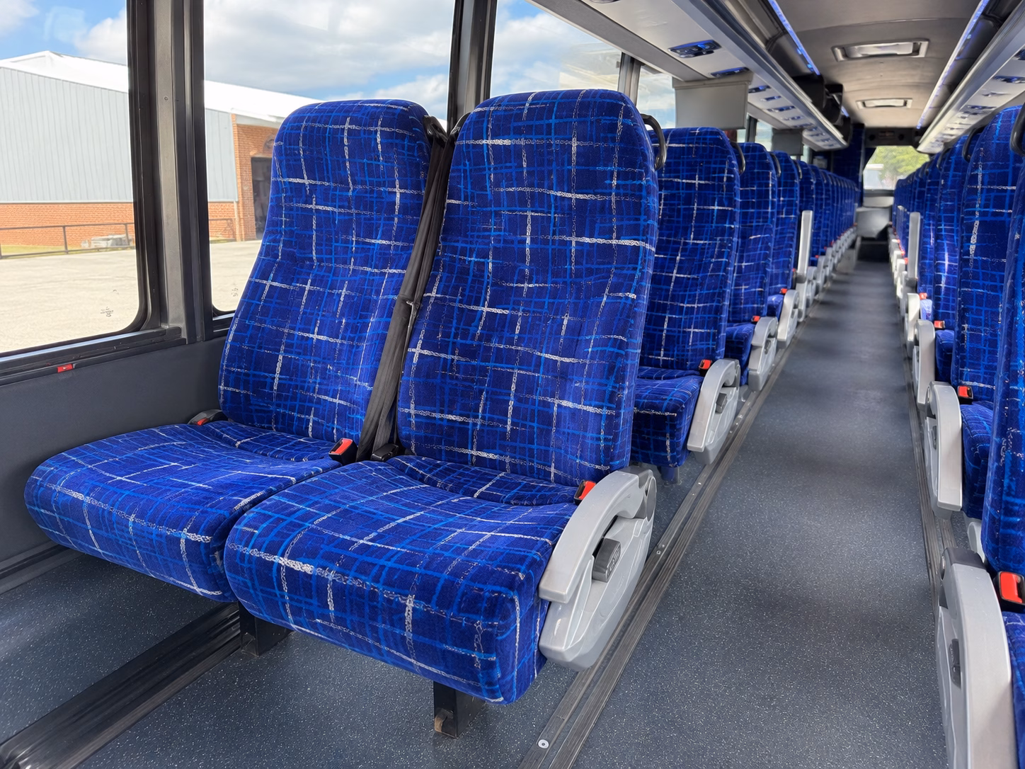 how starting location and deadhead affect charter bus rates in wyoming michigan